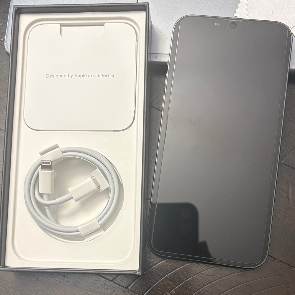 Apple Smartphone with White Charging Cable
